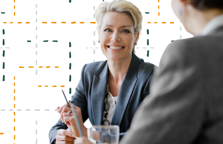 Smiling woman in business meeting